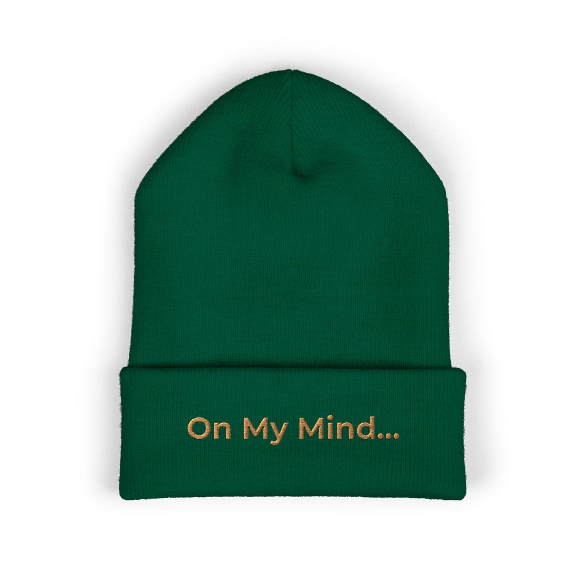 Spruce cuffed beanie with gold “On My Mind...” embroidery on the front.